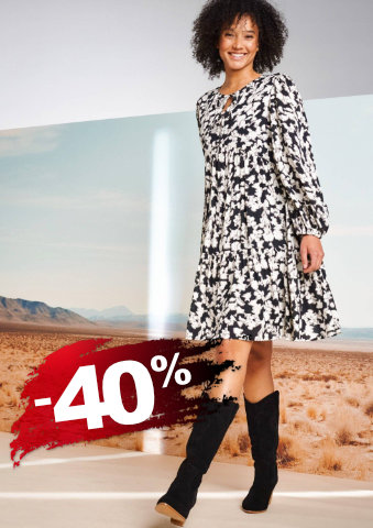 Krátké šaty s výstřihem na zavázání a potiskem